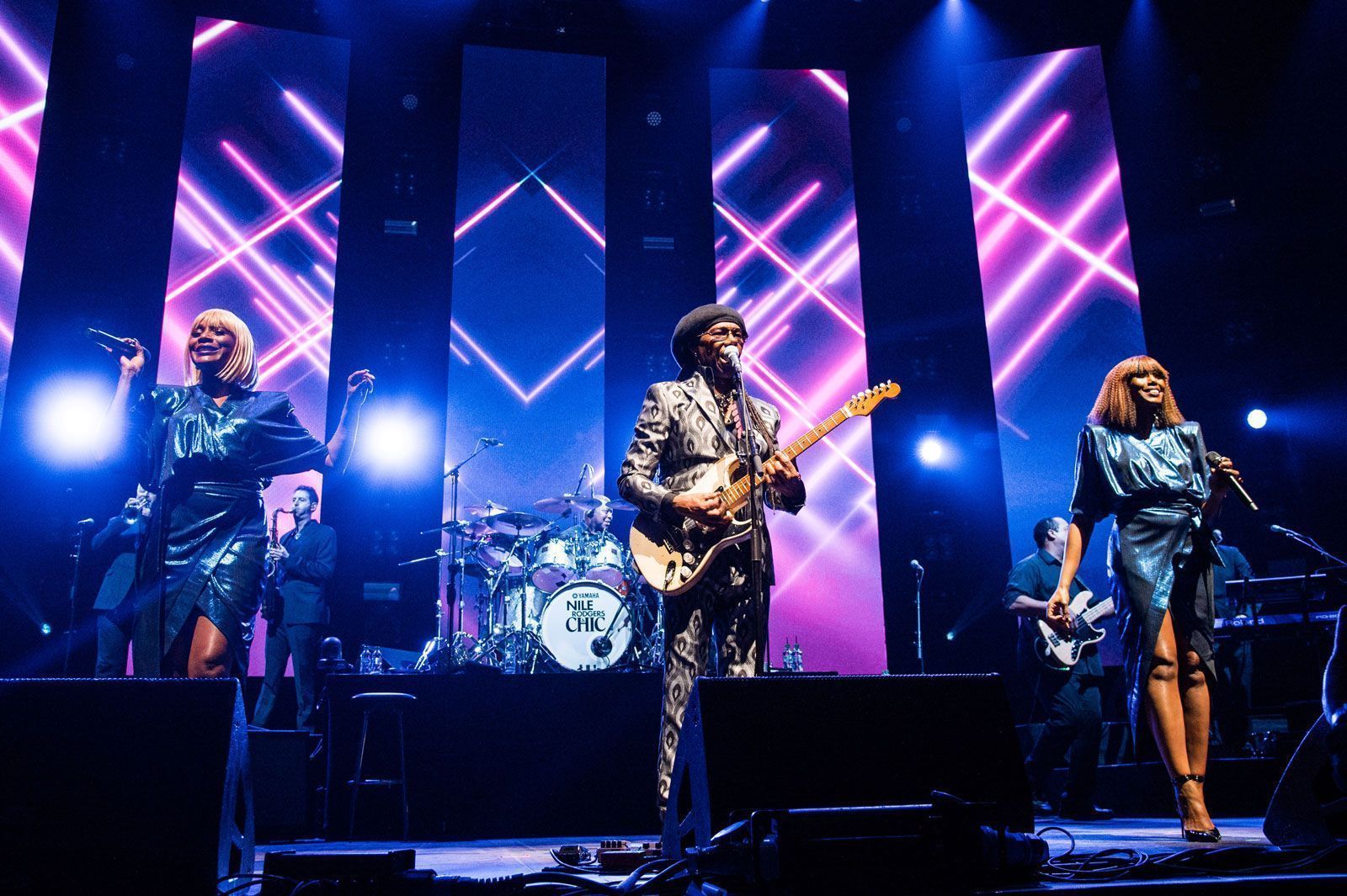 Large LED video wall lighting up a live concert stage